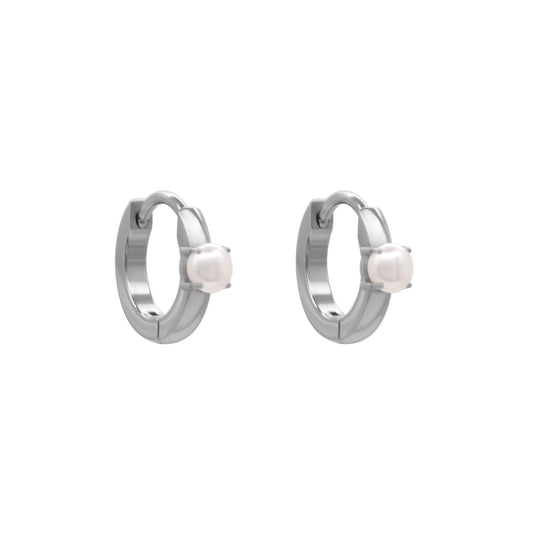 Titanium hoop huggie earrings with freshwater pearl by Swiss Hyper.