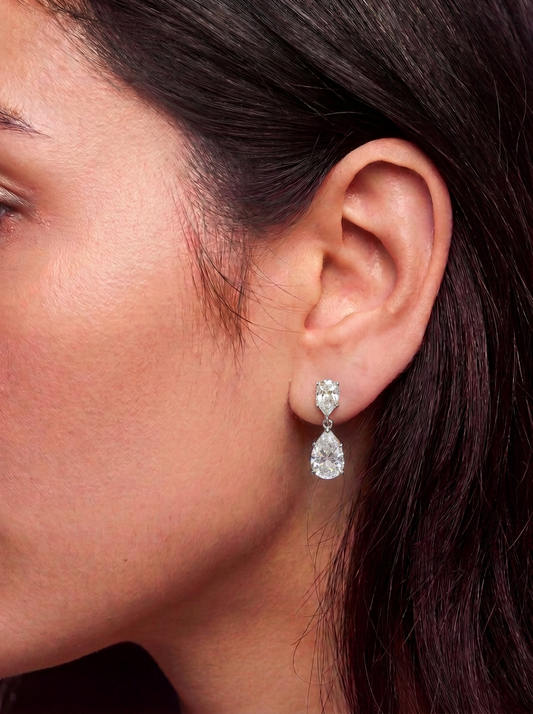 Hypoallergenic titanium earrings in implant grade titanium in a drop stud earring and teardrop design. Waterproof, tarnish-free, nickel-free, earrings for sensitive ears.